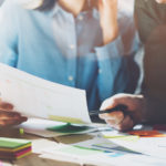 Couple working on paperwork taxes 128862107